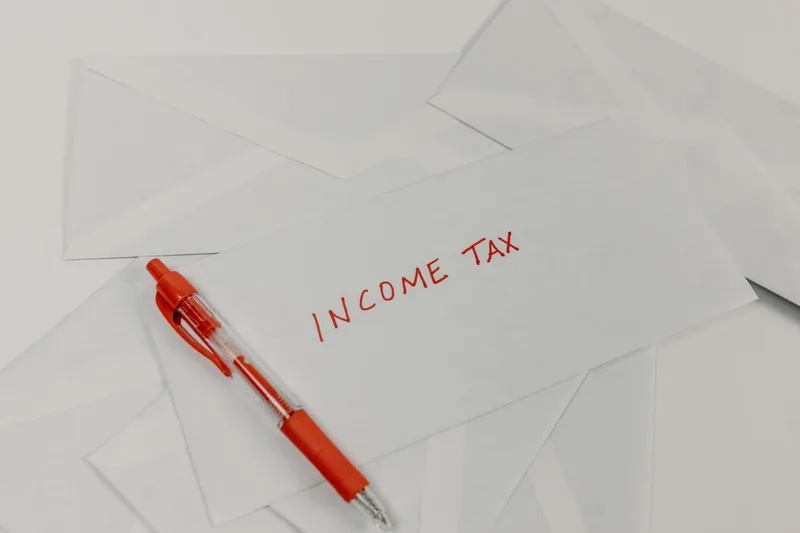 Income classification decision tree — qualifying vs non-qualifying activities under Cabinet Decision 55 of 2023