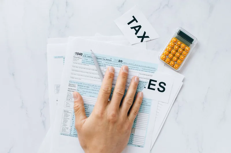 Infographic showing the three FTA registration types in UAE — VAT, Corporate Tax, and Excise Tax — with EmaraTax at center and applicable thresholds for each registration type