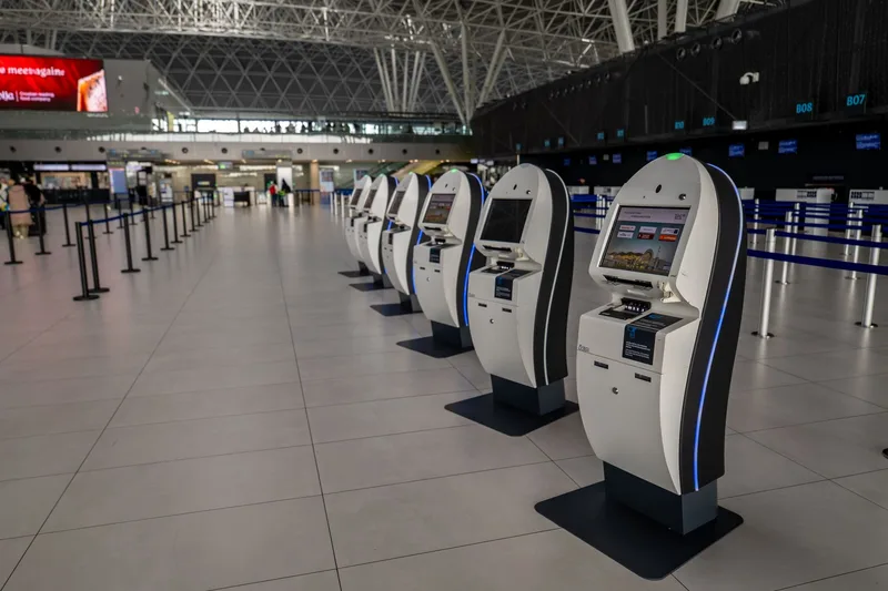 Photo of Planet Tax-Free kiosk at Dubai International Airport Terminal 3, showing the self-service scanning screen and refund counter